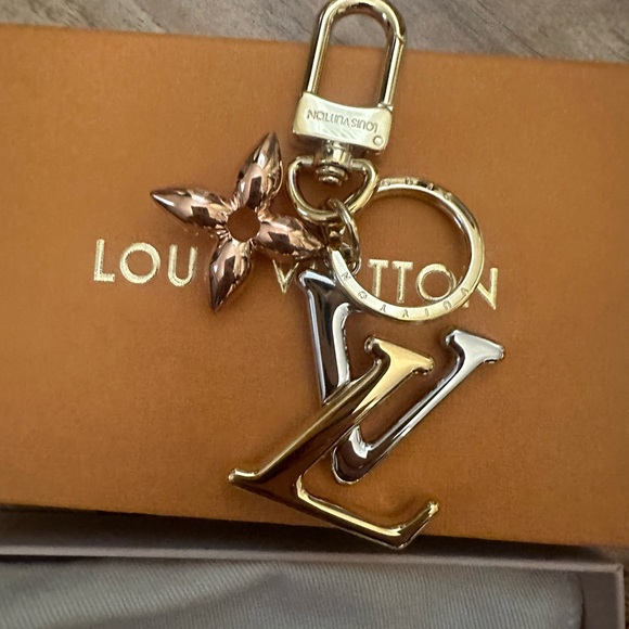 Louis Vuitton key chain/ bag charm brand new never used with receipt! - Picture 4 of 5